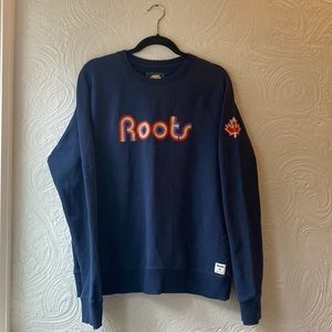 Roots sweatshirt navy blue with rainbow logo. Adult size XL.
